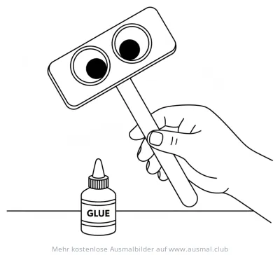 Hand hält selbstgebastelte Puppe mit Kulleraugen, daneben eine Klebstoffflasche Ausmalbild